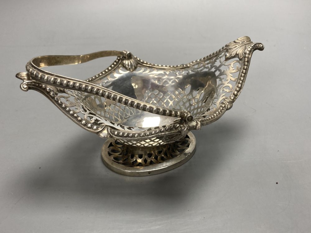 A late Victorian pierced silver boat shaped bonbon basket, Charles Stuart Harris, London, 1890, width 17cm, 7oz.